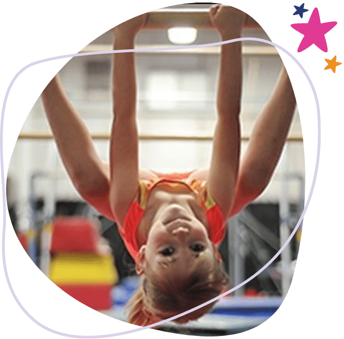 Young Gymnast Hanging Upside Down